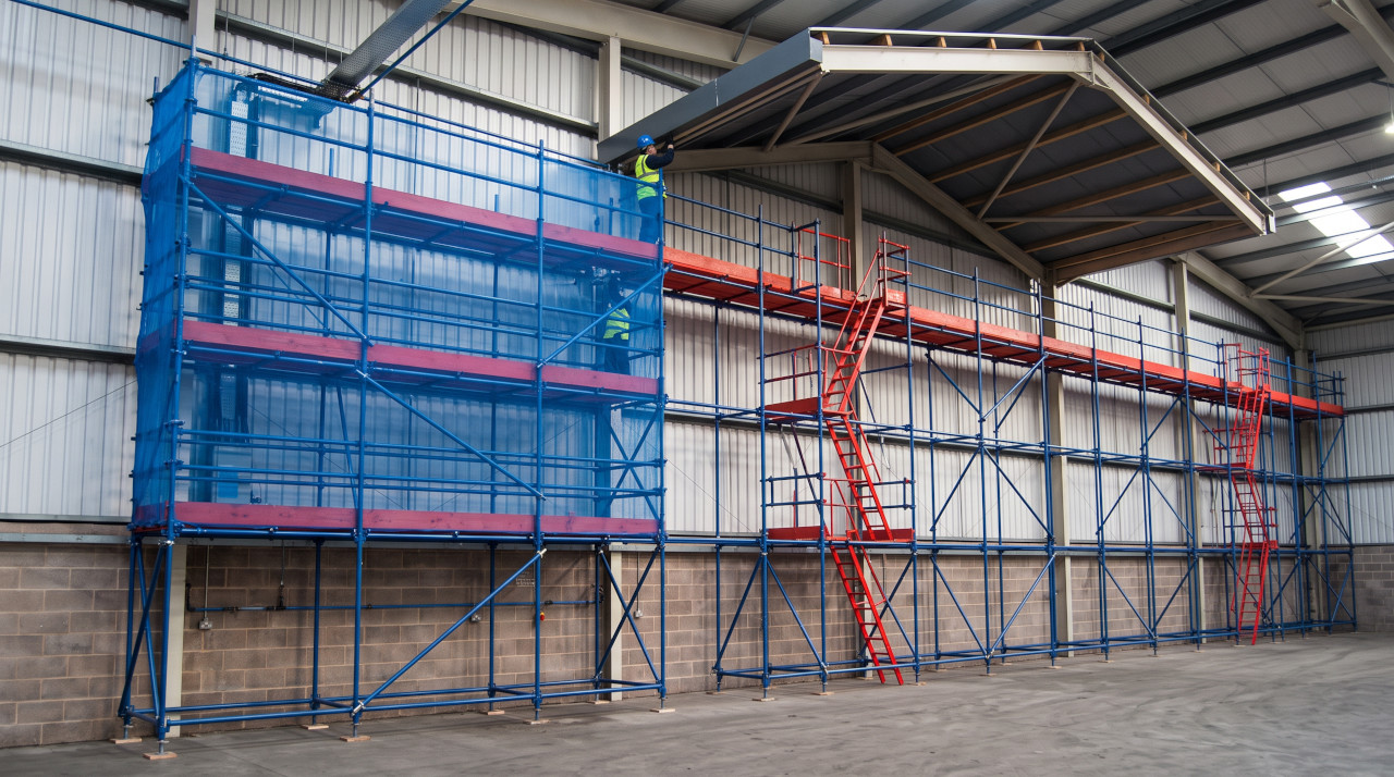 worker on wikstage scaffold